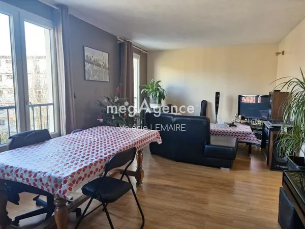 Appartement T3 62m² + cave + 2 places de parking