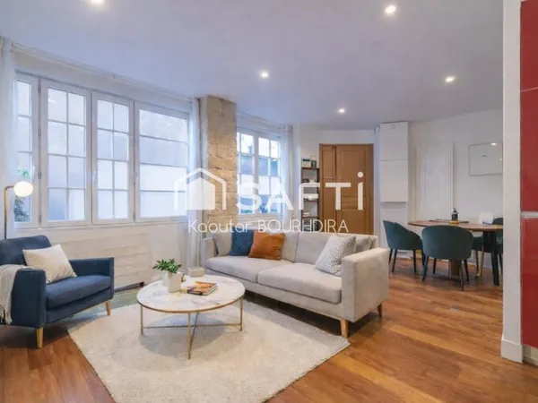 Appartement d'exception en souplex - Volumes remarquables - Paris 11€