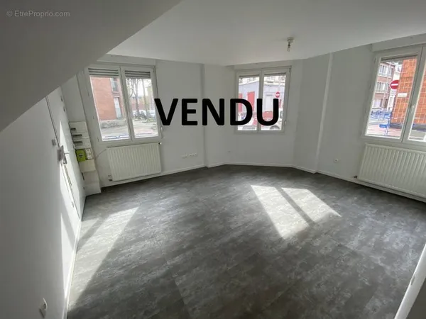Dunkerque centre: appartement lumineux en RDC de 61m2 aux normes PMR, 2 chambres, cour.