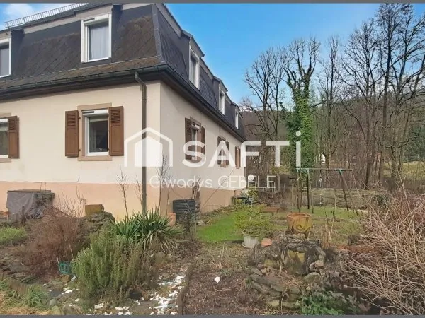 Maison de 200m² avec jardin et grange, au calme
