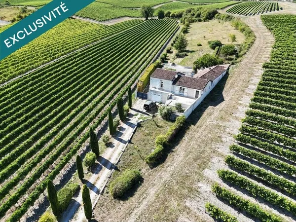 Maison de 170m² avec trois garages en pleine campagne
