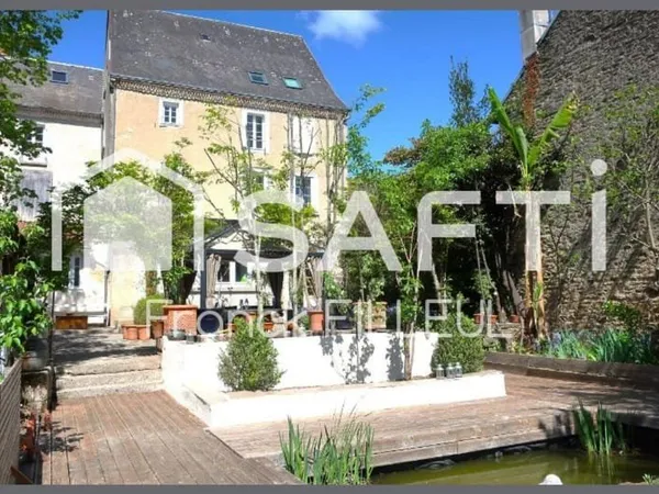 Maison 10 pièces 376 m²