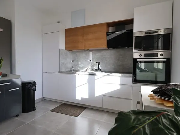 MARCHÉ CENTRAL - Appartement de 61 m² avec balcon & parking