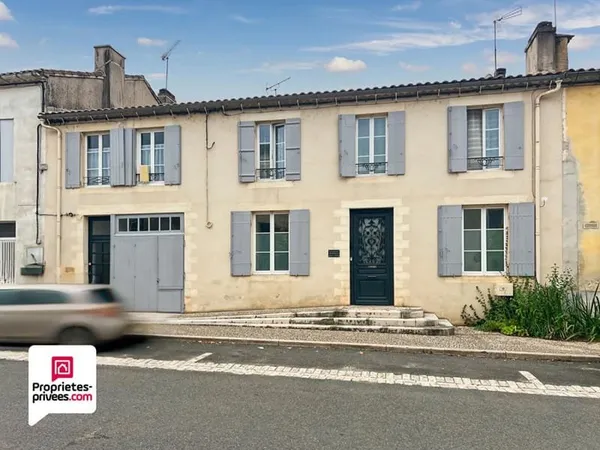 Immeuble composé de 3 lots - jardin et garages