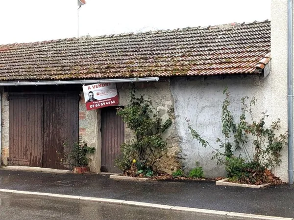 Terrain avec Garage et dependance