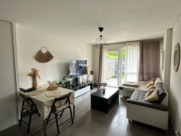 Appartement rez de chaussée avec garage et jardin attenant