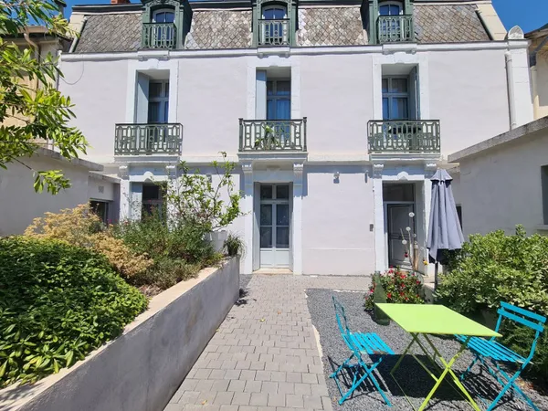 Appartement en rez-de-jardin 3 pièces 100 m²