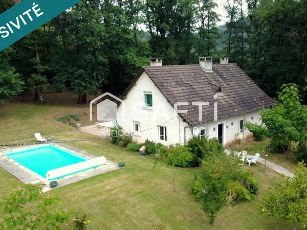 Maison 6 pièces avec cave garage atelier et piscine