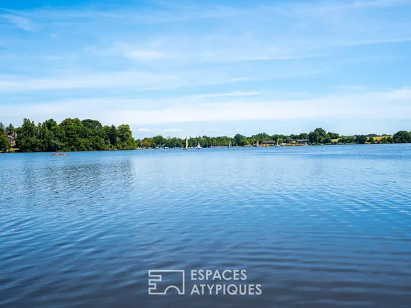 Maison familiale et sa piscine couverte face à l'Erdre à La Chapelle-sur-Erdre