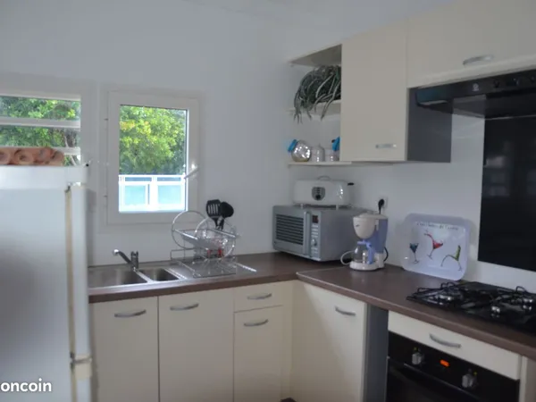 Maison mitoyenne dans résidence privée