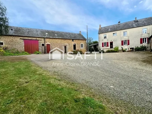 Corps de ferme avec hangar récent et dépendances -