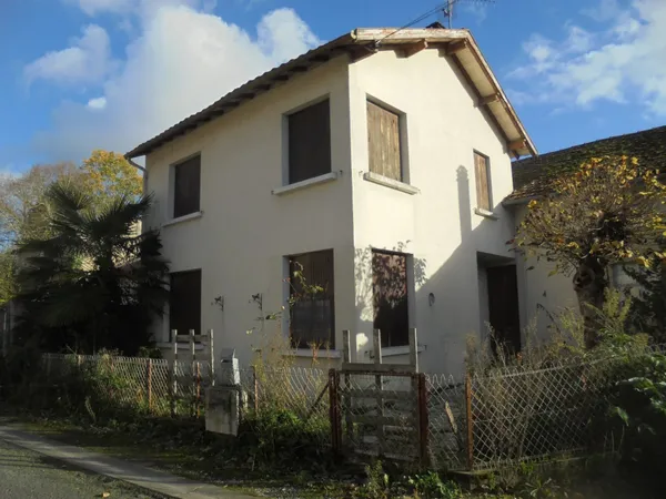 Maison à rénover avec grand garage