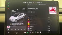 Tesla Model Y Standard RWD — photo 18