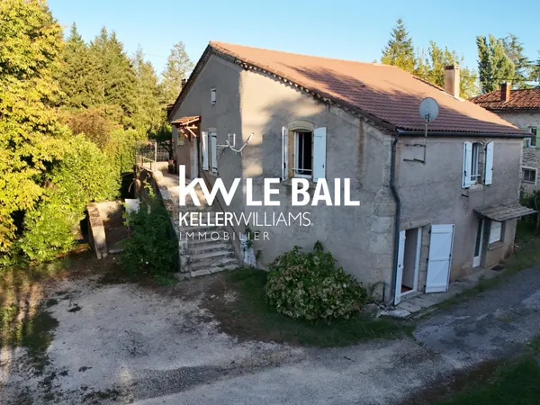 Maison en pierre avec grange au bord du Lot
