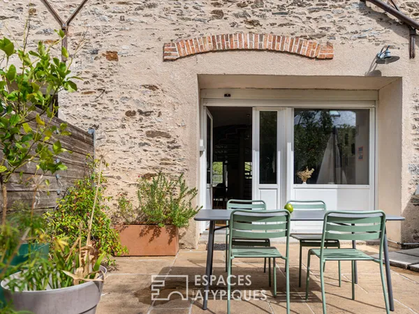 Maison familiale type loft cachée à deux pas du jardin des plantes