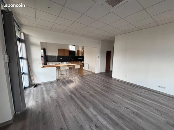 Appartement 2 pièces de 58 m² en RDC avec jardin de 90 m², clim et parking fermé