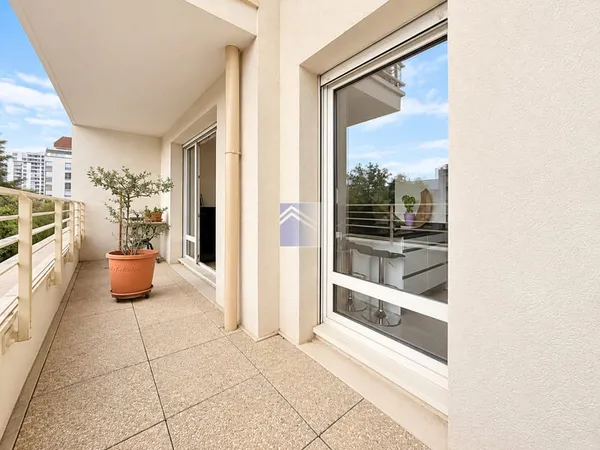 COEUR DE VILLE - 3 pièces de 69,57 m2 - DEUX BALCONS, CAVE E