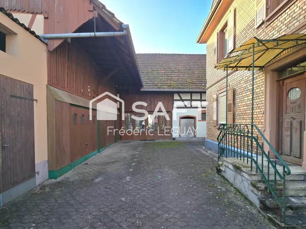 Grande maison avec multiples possibilités d'explotation