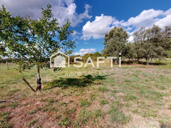 Terrain agricole avec bâtiment