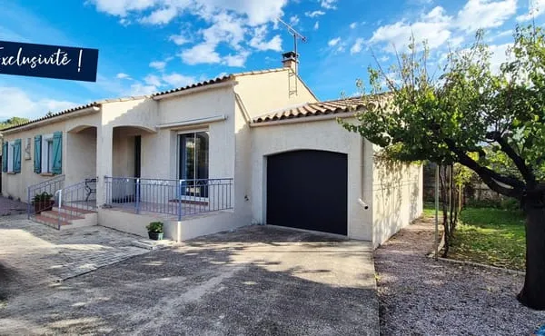 PLAIN PIED AVEC JARDIN ET GARAGE