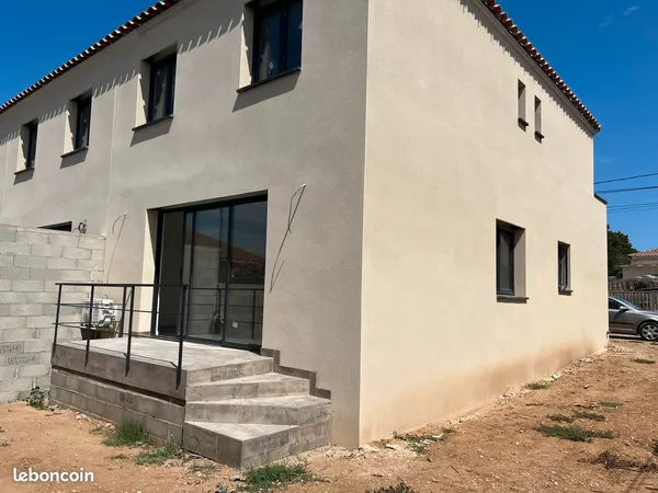Maison mitoyenne P4 jardin et parking