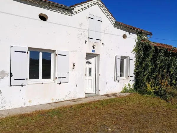 Maison- 3 pièces avec jardin et grand garage
