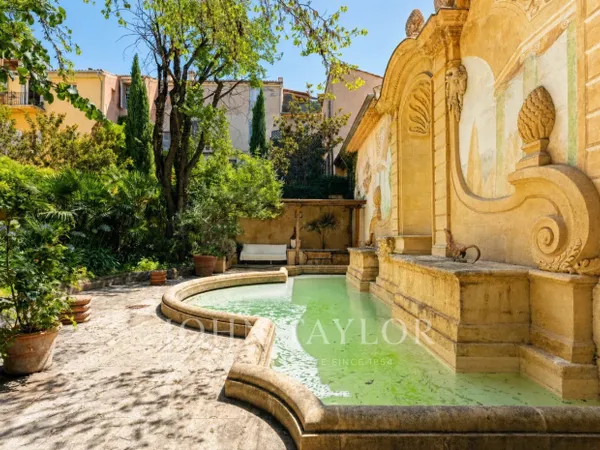 Appartement d'exception avec jardin et piscine au coeur du quarti