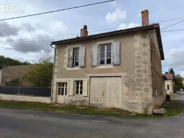 Maison a renover avec garage et terrain