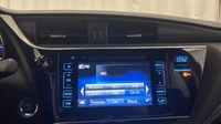 Toyota Auris Touring Sports HSD 136h Executive — photo 19