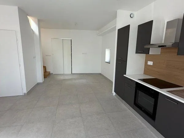 Appartement neuf - cave - parking - terrasse