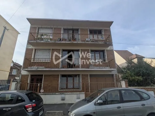 Ensemble immobilier 307 m² en zone commerciale 4 logements,