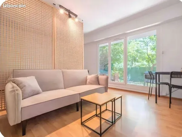 Appartement meublé avec jardin privatif et parking tout confort