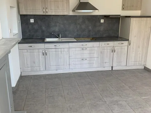 Maison avec terrain dans le centre
