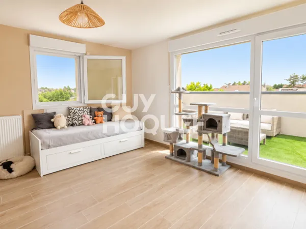 Appartement à vendre de 2 pièces de 51 m² avec place de parking couverte - Ascenseur