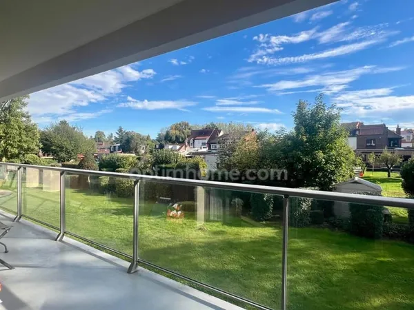 Appartement 74 m² avec garage, stationnement et balcon