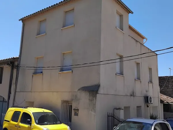 Bien immobilier de rendement Vente Nîmes 12p 171m² 490000€