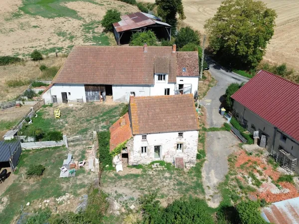 Écrin de verdure & potentiel d'exception : Ensemble immobilier de charme sur plus de 2 hectares à La