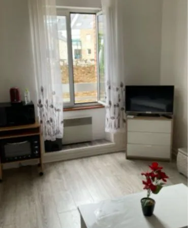 Studio pied des remparts