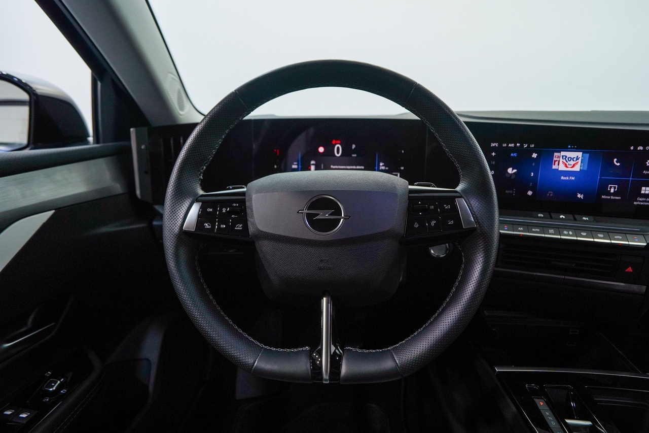 Opel Astra — photo 17