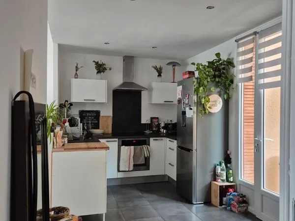 Appartement F4 avec grande terrasse couverte
