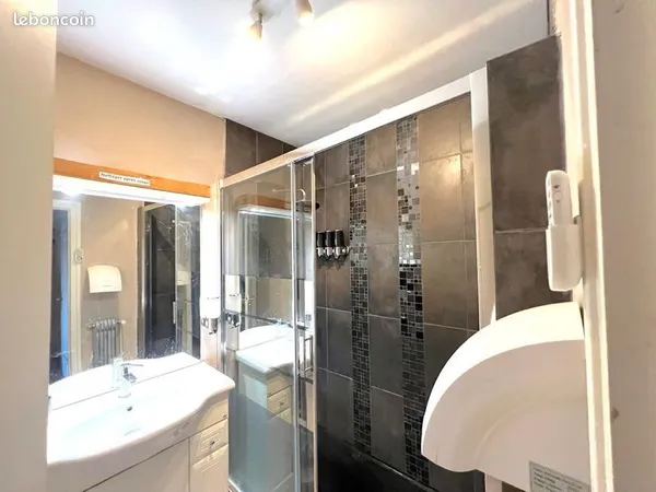 Appartement 64 m² - 2 chambres - balcon - cave