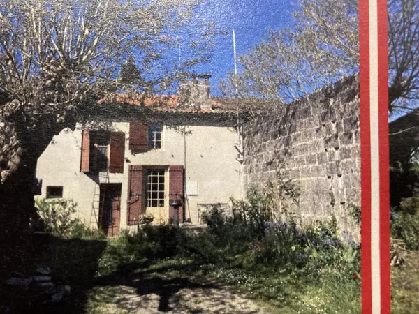 Maison ancienne en pierre, mitoyenne