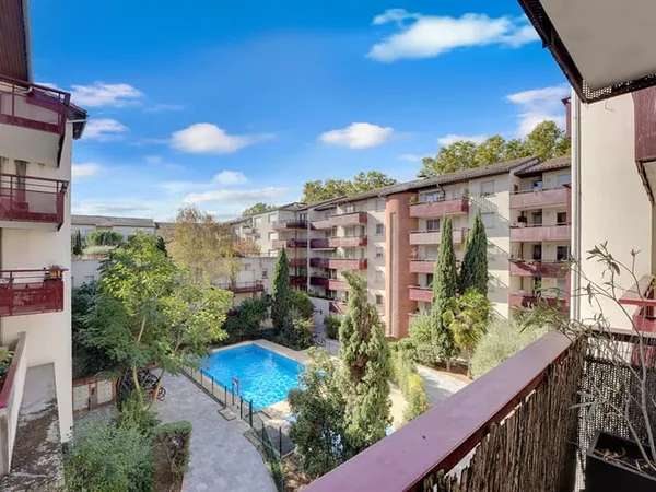 MINIMES CANAL DU MIDI T4 TRAVERSANT AVEC BALCONS, GARAGE ET PARKING