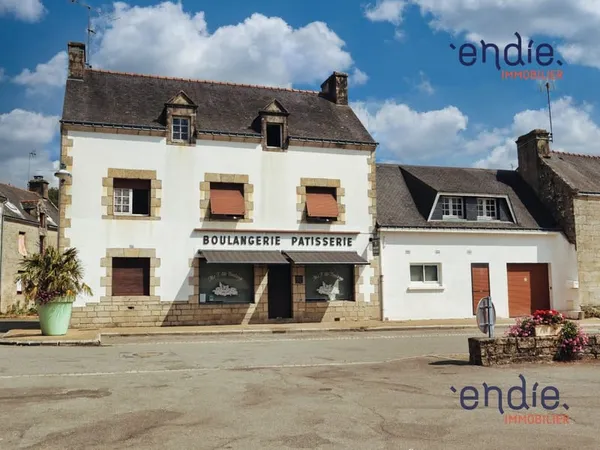 Immeuble de rapport avec local commercial loué et potentiel de