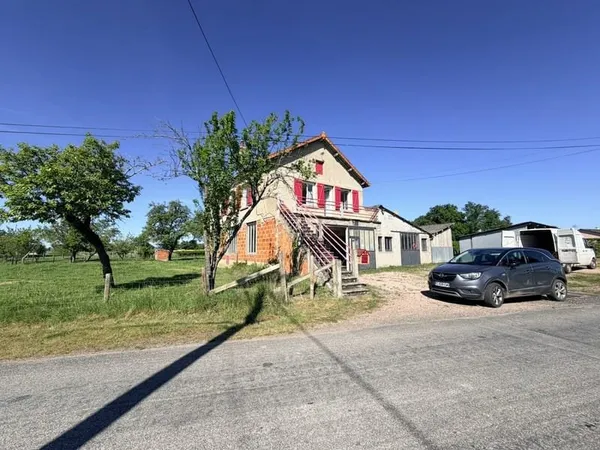 Maisdon d'habitation de 90 m2 hab et atelier.