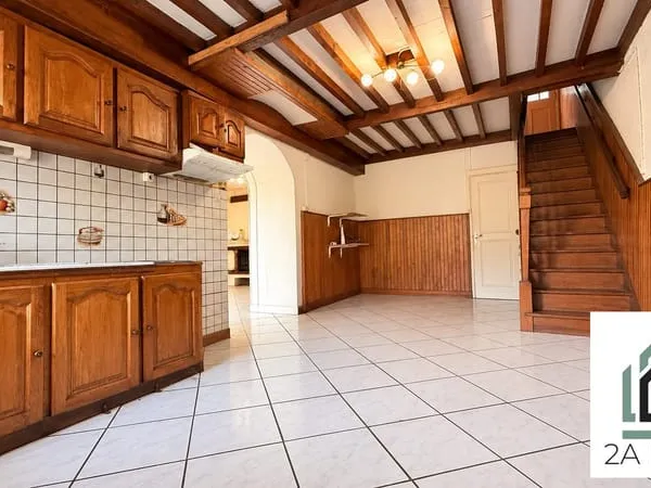 Maison 2 chambres - Double garage - Mitoyenne d'un coté