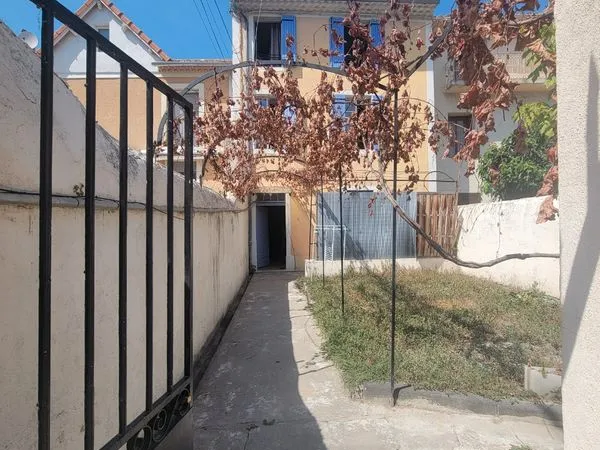 T3 de 42m2 de charme avec jardin a partager