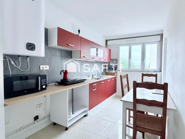 A SOISSONS 02, QUARTIER MAUPAS, APPARTEMENT 4 P. AVEC BALCON, CAVE ET GARAGE.