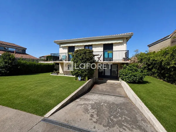 Maison 7 pièces 215 m²