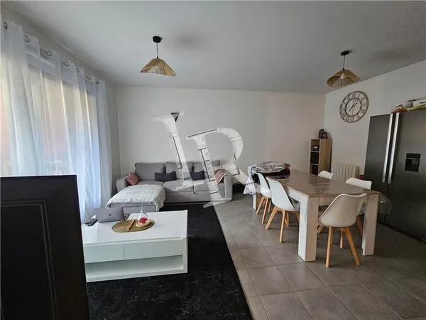 Appartement T2 avec terrasse, cave et garage